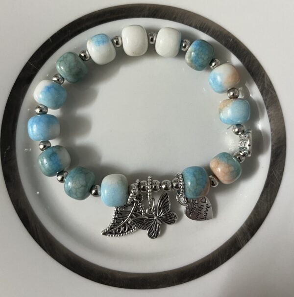 buterrfly/leafcharm marbel beaded bracelet pandora style