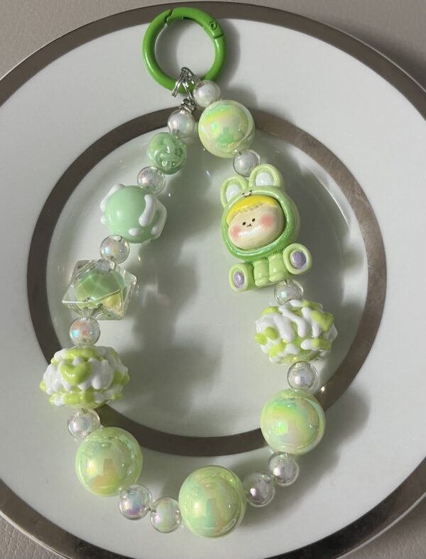 https://beadsgallery.shop/wp-content/uploads/2025/03/spaceboy-green-keychain.jpeg